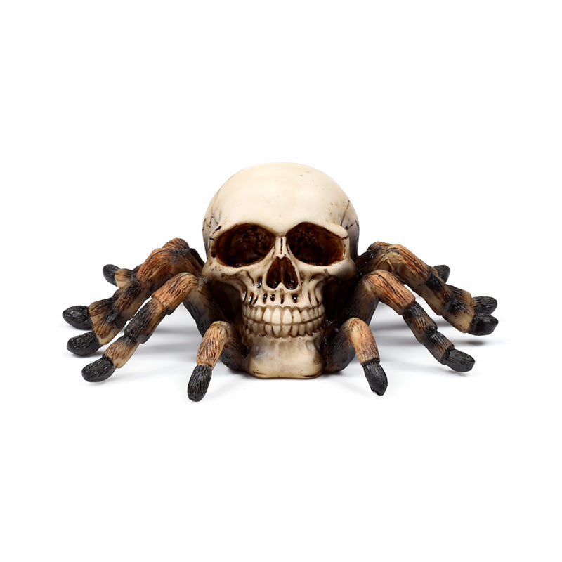 Close-up of decorative skull ornament with spider legs