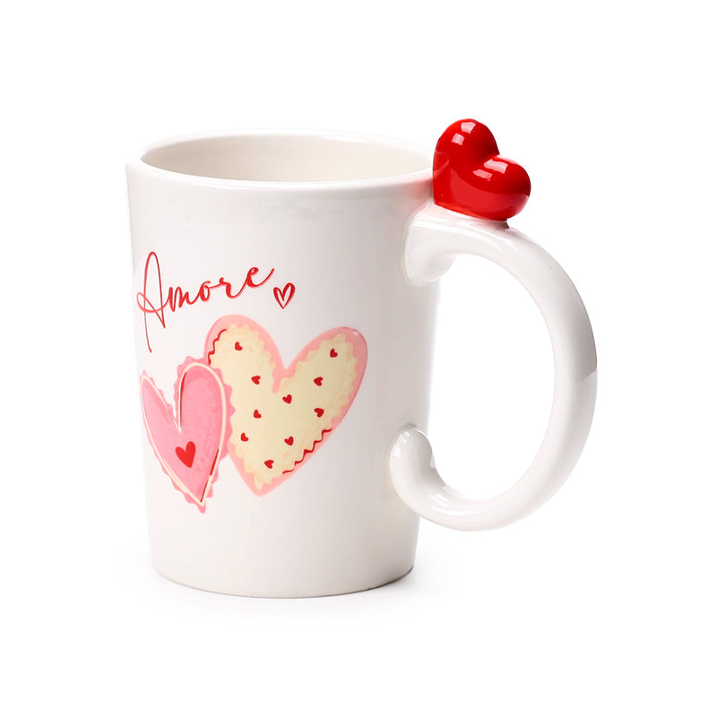 Amore Heart Shaped Handle Ceramic Mug in a cozy setting