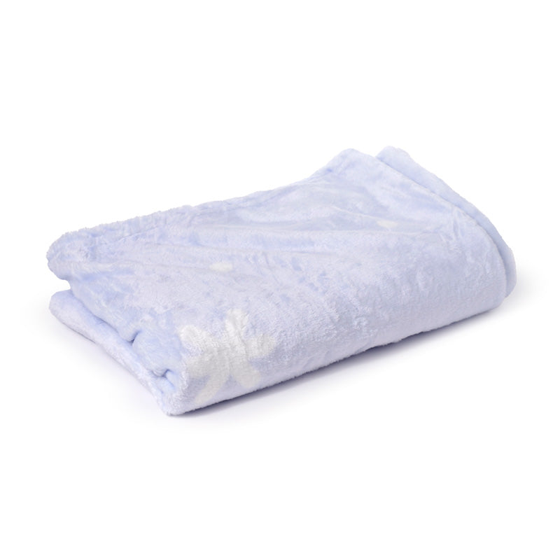 Nico the Penguin travel blanket rolled up