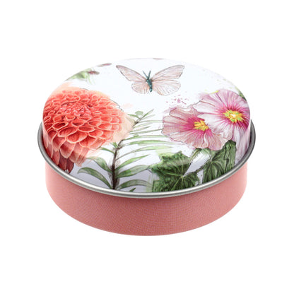 Butterfly Meadows Lip Balm displayed on a rustic table