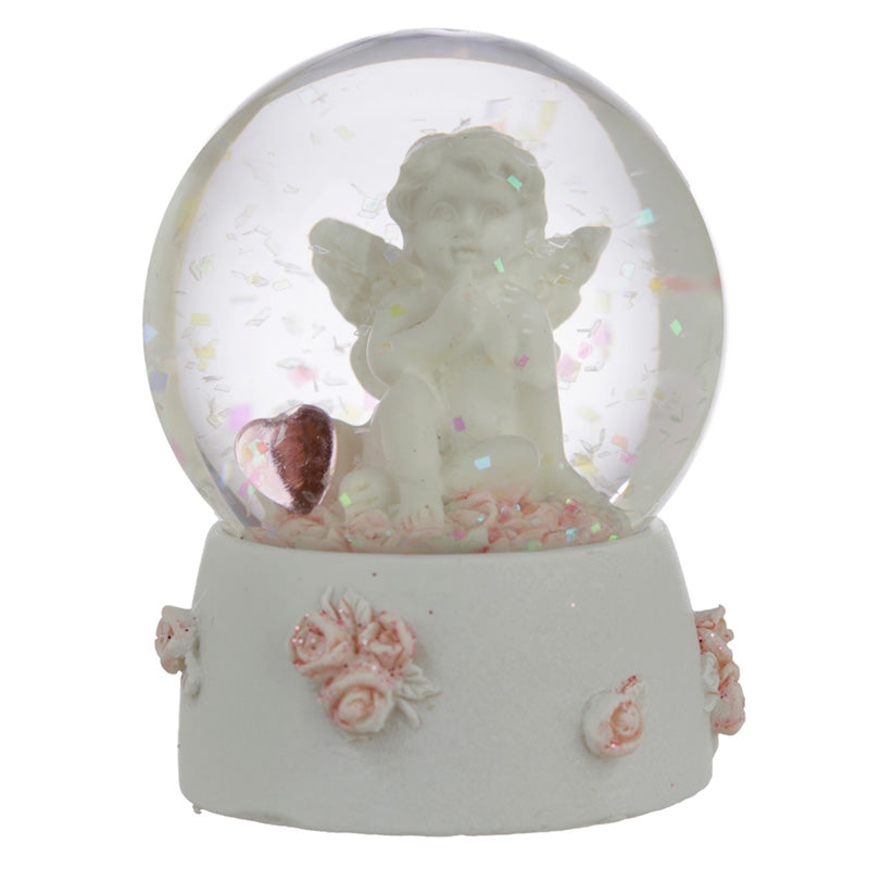 Serene snowfall effect in the cherub snow globe
