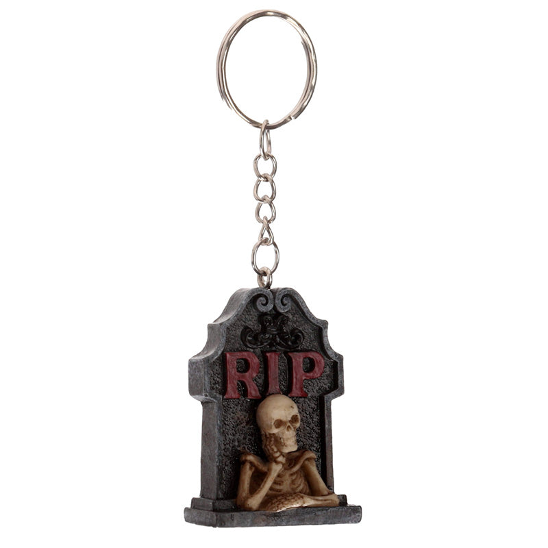 Collectible keyring featuring skeleton and tombstone