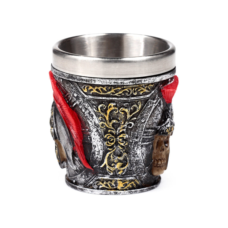 Close-up of decorative shot glass with Roman soldier