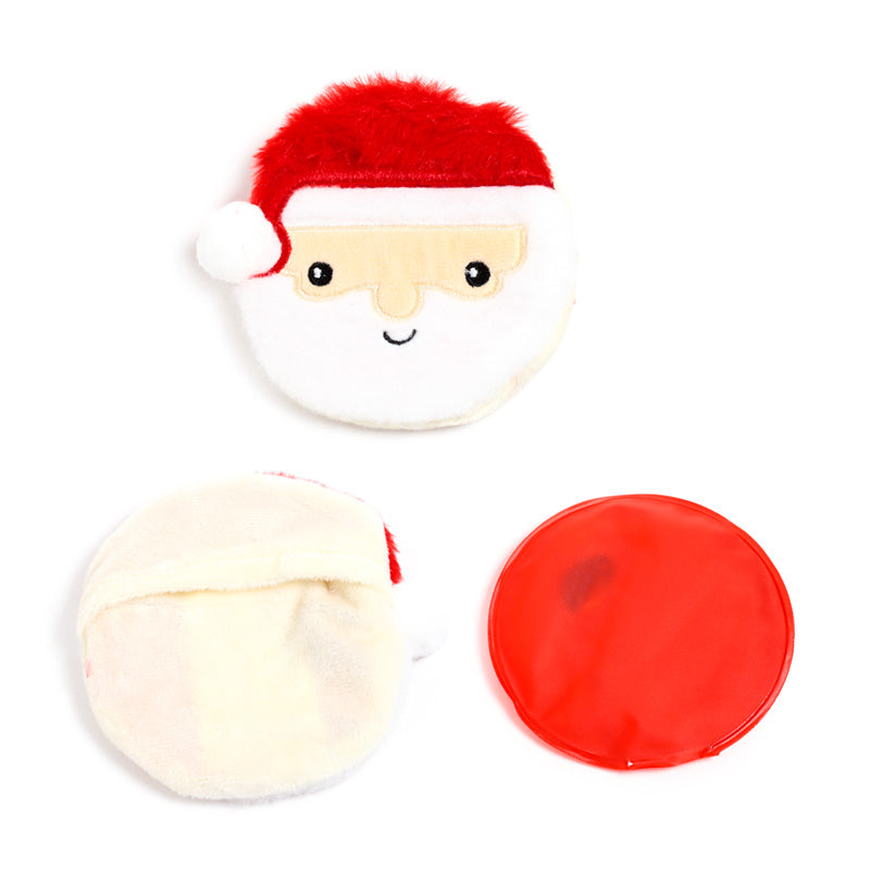 Plush Hand Warmer - Christmas Jingle Bunch on a festive table