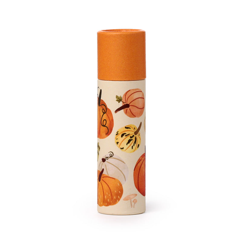 Autumn Harvest Lip Balm displayed with seasonal decor