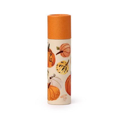 Autumn Harvest Lip Balm displayed with seasonal decor