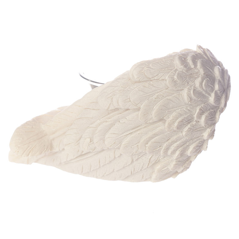 Winged White Angel Votive Holder in serene setting