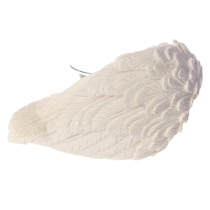 Winged White Angel Votive Holder in serene setting
