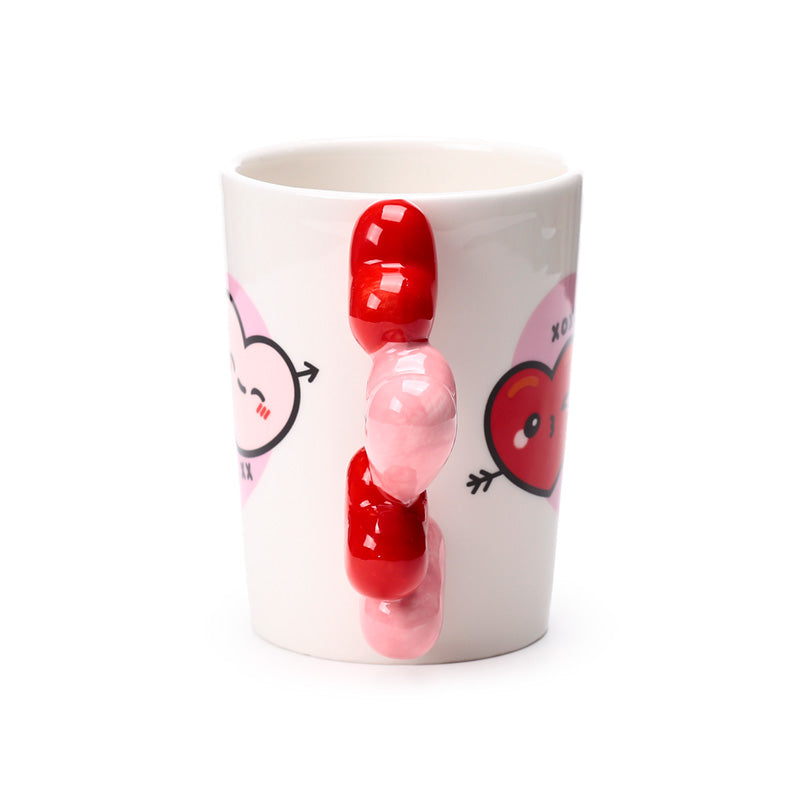 J'Adoramals Heart XOXO Mug displayed among home decor