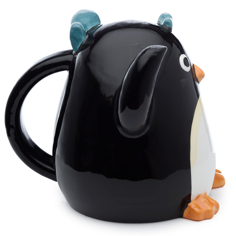 Collectible Huddle Penguin mug in a playful setting