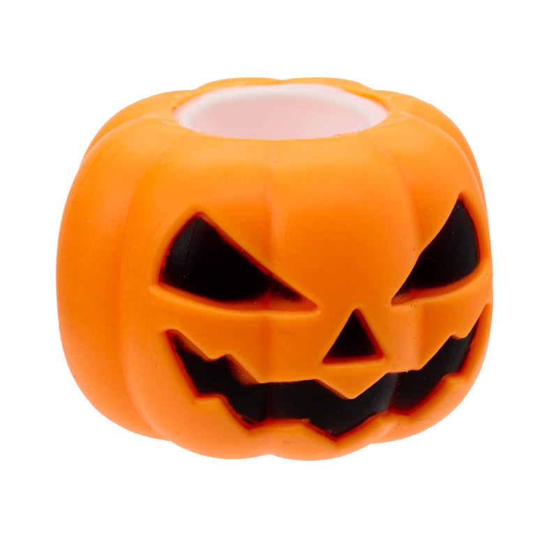Pumpkin Ghost toy surrounded by Halloween decorations