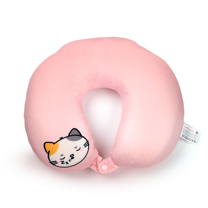 Lola the Cat travel pillow on a sofa