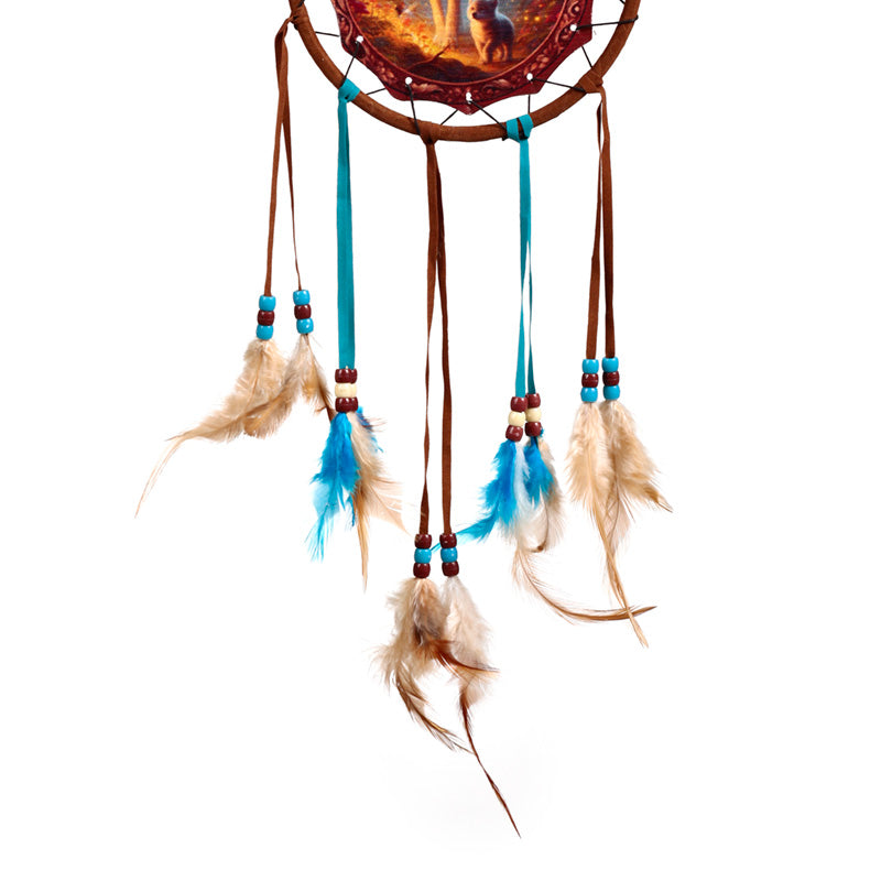 Decorative small dreamcatcher hanging in a room
