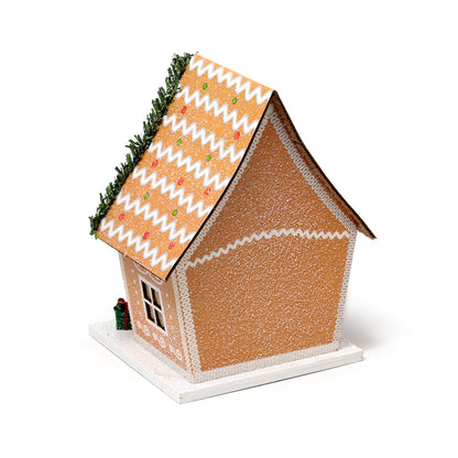 Gingerbread House decoration on a mantle