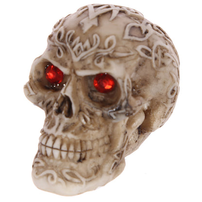 Close-up of Mini Gothic Skull Decoration with Gem Eyes
