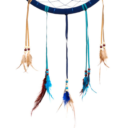 Dreamcatcher with feathers and decorative accents