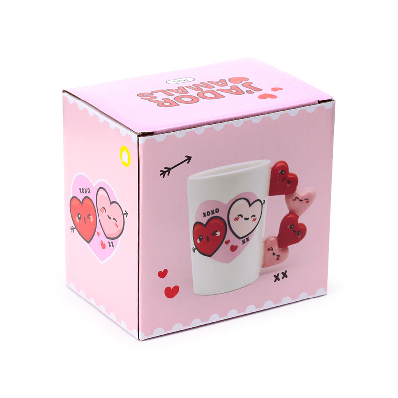 J'Adoramals Heart XOXO Mug in a cozy setting