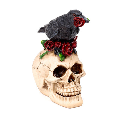 Decorative skull ornament with raven and red roses
