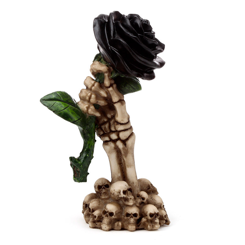 Close-up of Gothic Skull Decoration with Black Rose