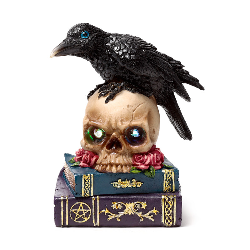 Close-up of crow on skull LED ornament