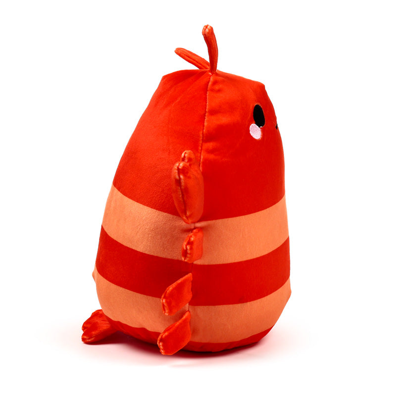Pierre the Lobster plush toy in a playful setting