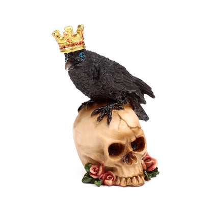 Gothic crow ornament with crown and skull base