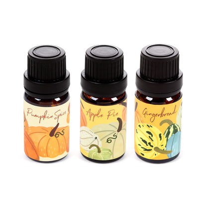 Elegant glass vials of Autumn Harvest fragrance oils
