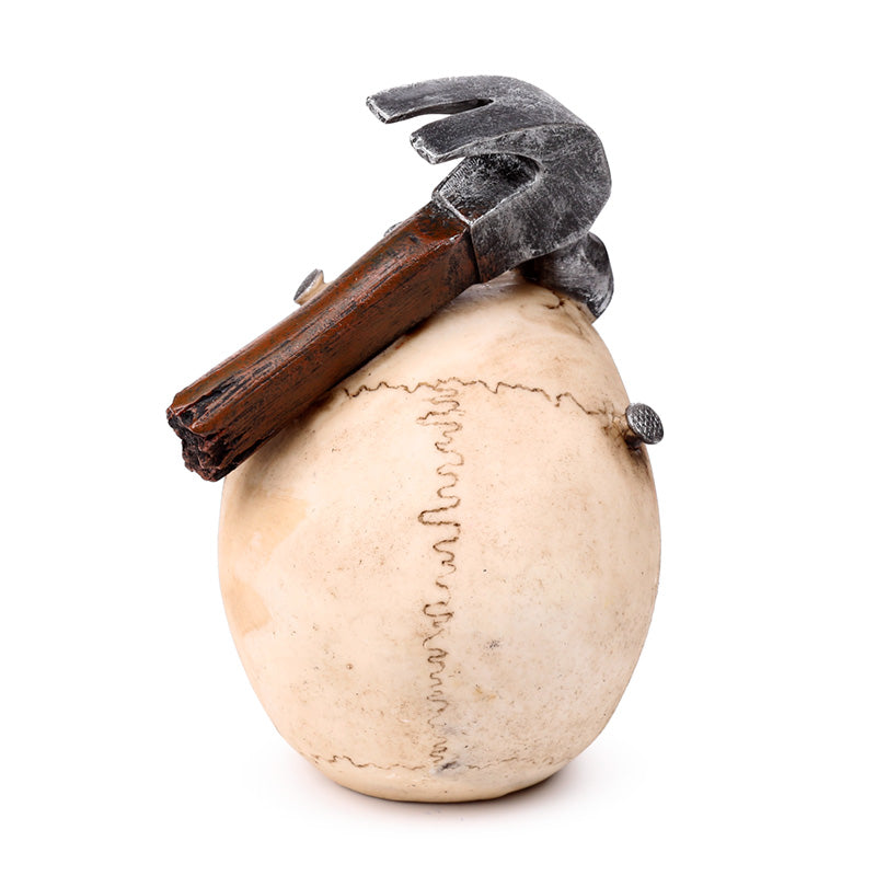 Decorative Skull with Hammer and Nails