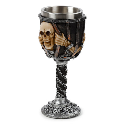 Close-up of the skull in chains decorative goblet