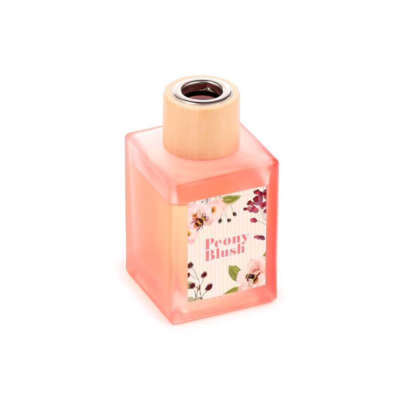 Nectar Meadows Peony Reed Diffuser with floral background