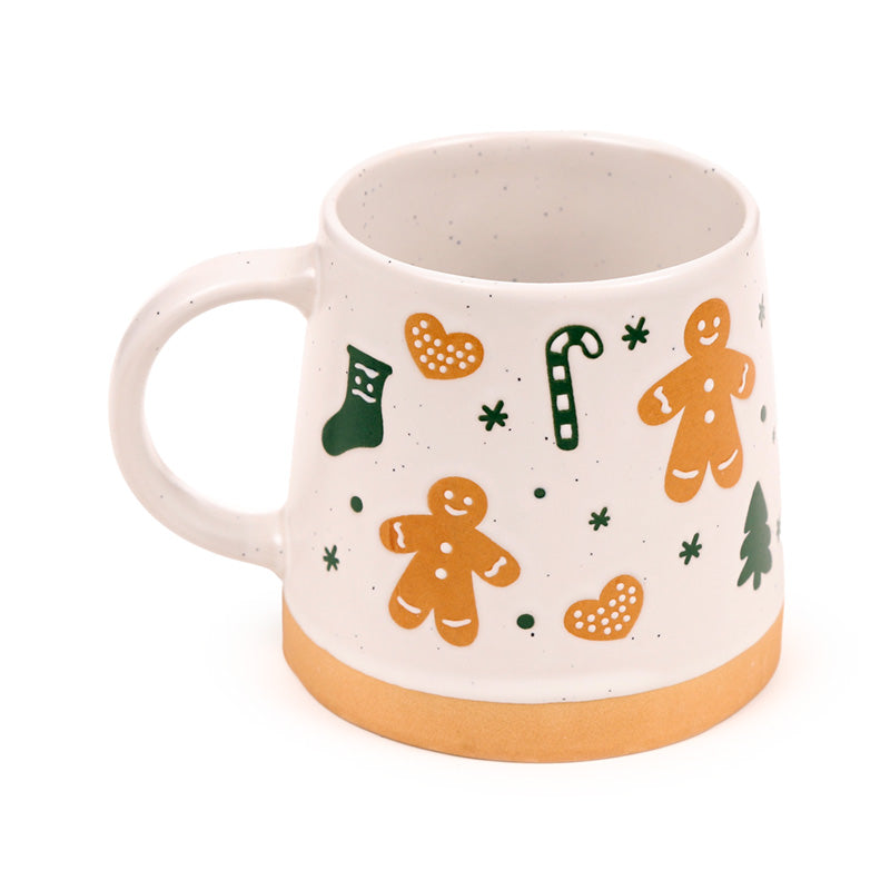 Gingerbread Man Stoneware Mug on a festive table