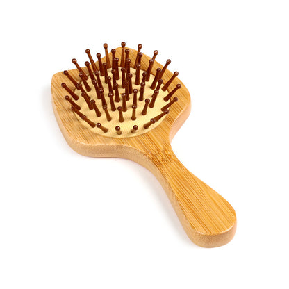 Close-up of Bamboo Hair Brush with cat design