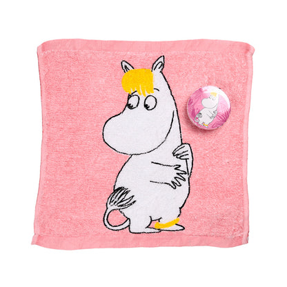 Moomin Tammi towel displayed with other travel essentials