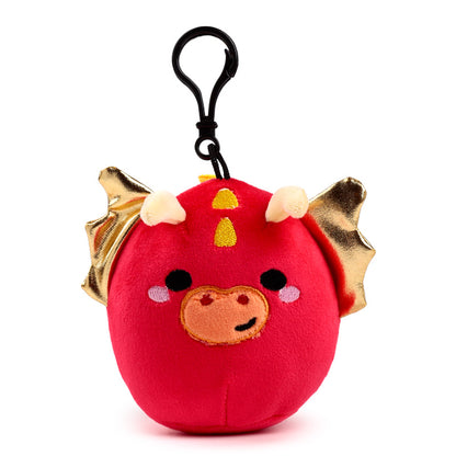 Squidglys Plush Keyring displayed with other decorative items