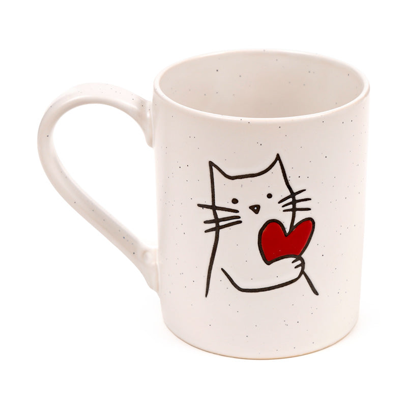 Stoneware cat mug with tea and biscuits