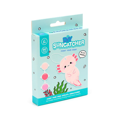 Vibrant paints and brush for DIY suncatcher