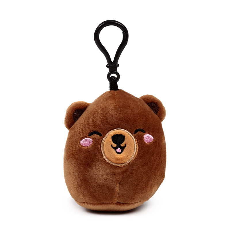 Squidglys Plush Mini Keyring displayed with other collectibles