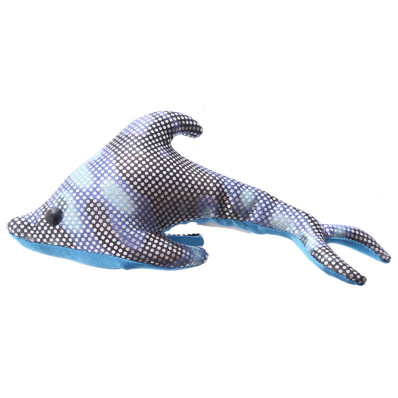 Collectible dolphin sand animal on display