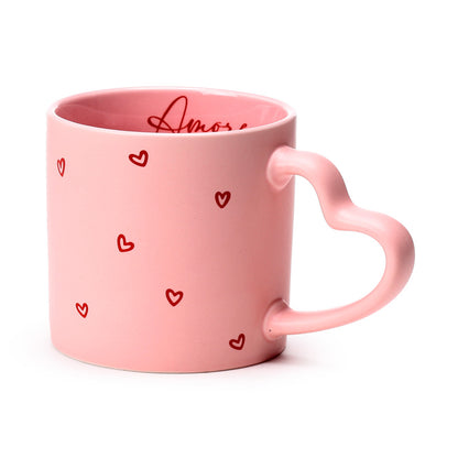 Amore Heart Shaped Handle Mug in a cozy kitchen setting