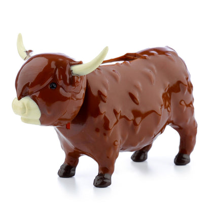 Highland Coo Cow ornament on patio